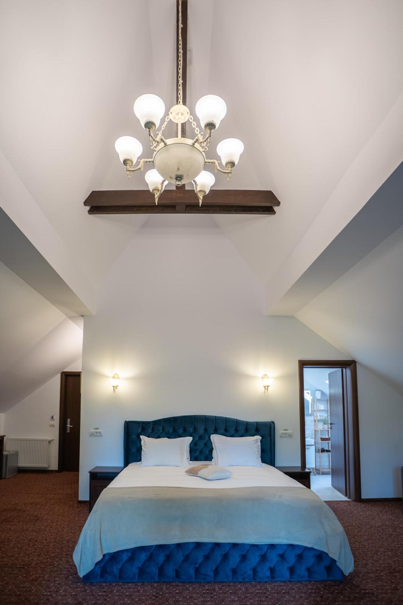 Opus Villa Sinaia Luaran gambar A bedroom at the hotel